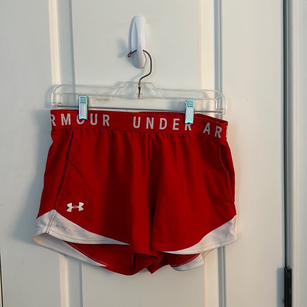 Red Under Armor athletic shorts
